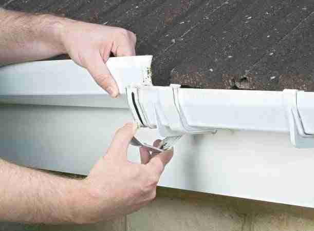 Gutter Cleaning and Repair | Tiger Stripes